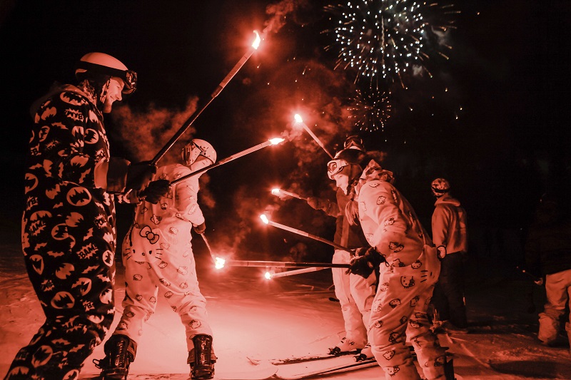 Vail ski and snowboard instructors, some dressed up, help celebrate the New Year after the Torchlight Parade on Golden Peak, Saturday, Dec. 31, 2016, in Vail, Colorado. More than 200 instructors and hundreds of Beavo ski school students participated, which followed with fireworks. Photo: Chris Dillmann / Vail Daily via Associated Press