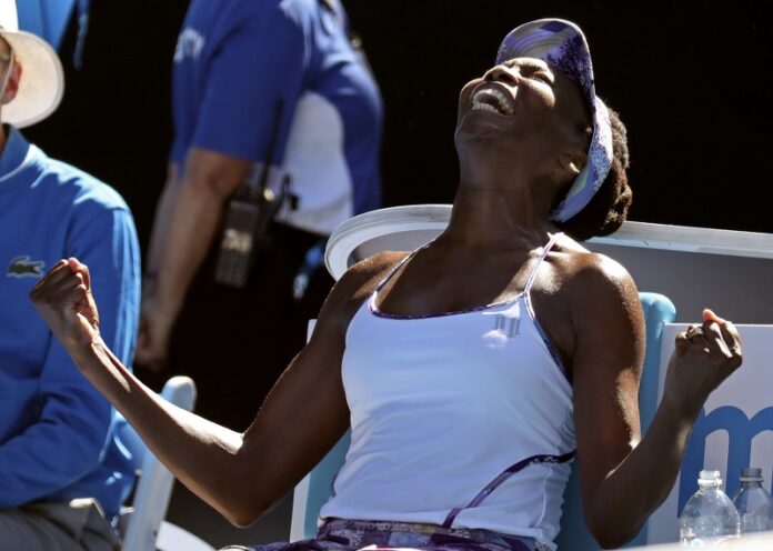 United States' Venus Williams celebrates after defeating compatriot Coco Vandeweghe during their semifinal Thursday at the Australian Open tennis championships in Melbourne, Australia. Photo: Aaron Favila / Associated Press