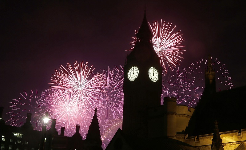 Fireworks explode over Elizabeth Tower housing the Big Ben clock to celebrate the New Year in London, Sunday, Jan. 1, 2017. Photo: Frank Augstein / Associated Press