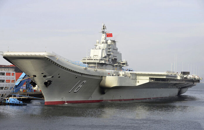 China's aircraft carrier Liaoning berths at a Chinese port in a file photo. Photo: Lit Tang / Xinhua News