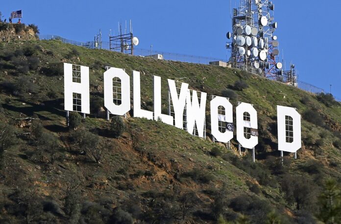 The famed Hollywood sign is seen altered to read