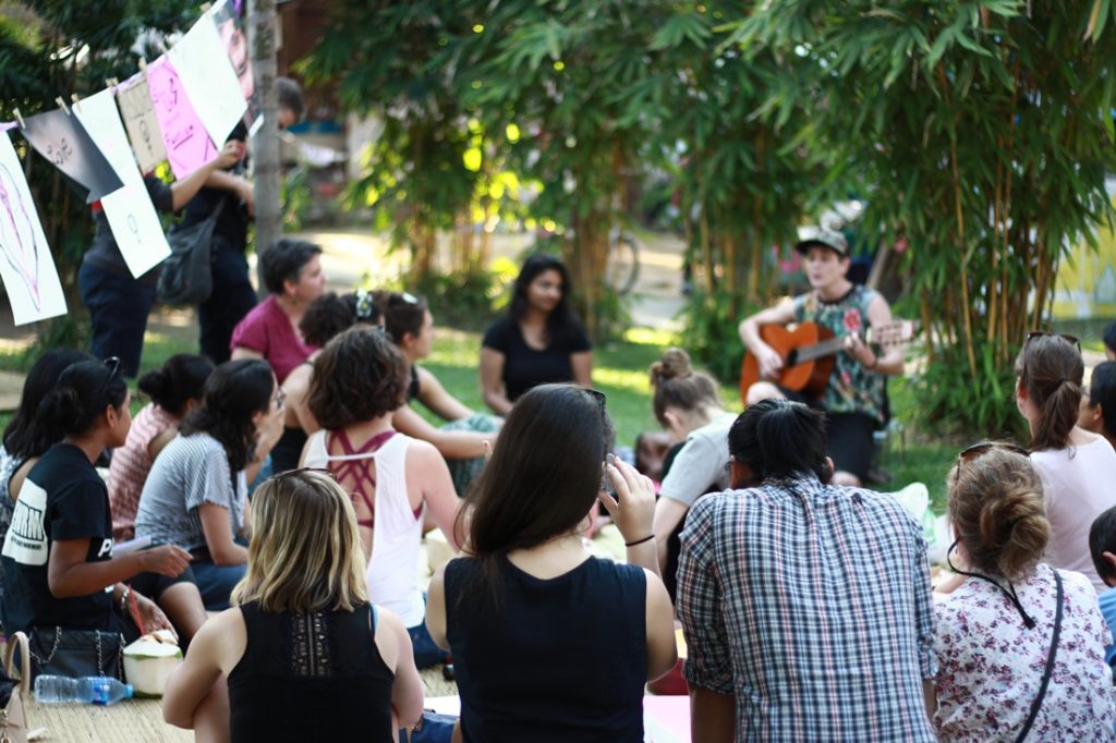 Activists stage an event Saturday in Chiang Mai province in solidarity with opposition to U.S. President Donald Trump. Photo: Molly Ferra / Courtesy