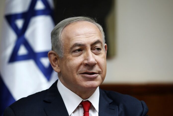 Israeli Prime Minister Benjamin Netanyahu attends the weekly cabinet meeting in 2017 in Jerusalem. Photo: Ronen Zvulun / Associated Press