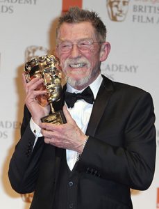 Sir John Hurt poses with his award for 'Outstanding Contribution to Cinema' backstage at the BAFTA Film Awards 2012 in London. Photo: Joel Rya / Associated Press