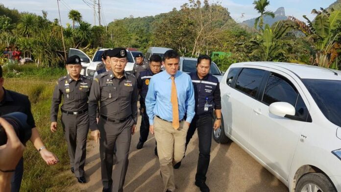 Police arrest fugitive U.S. national Alexander Rosen in Krabi on Wednesday morning.