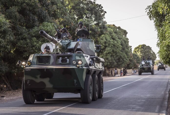 A convoy of Senegal soldiers en route towards the Gambia boarder with Senegal on Thursday near Karang, Senegal. Photo: Sylvain Cherkaoui / Associated Press