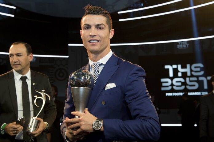 Cristiano Ronaldo of Portugal poses with the trophy after winning for The Best FIFA Men's Player award during the The Best FIFA Football Awards 2016 ceremony held in January 2017 at the Swiss TV studio in Zurich, Switzerland. Photo: Ennio Leanza / Associated Press