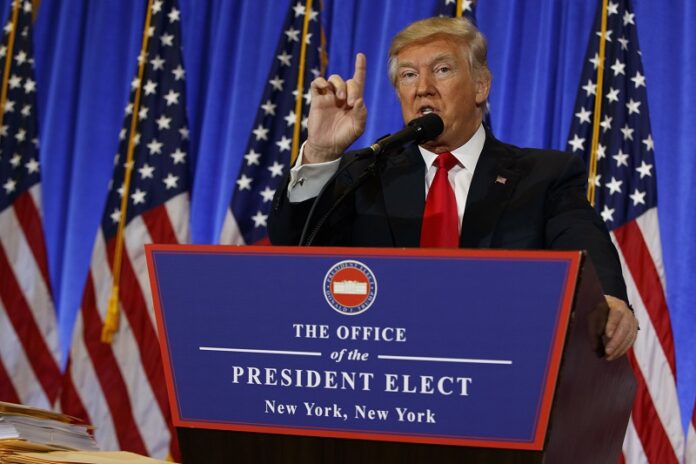 President-elect Donald Trump speaks Wednesday during a news conference in the lobby of Trump Tower in New York. Photo: Evan Vucci / Associated Press