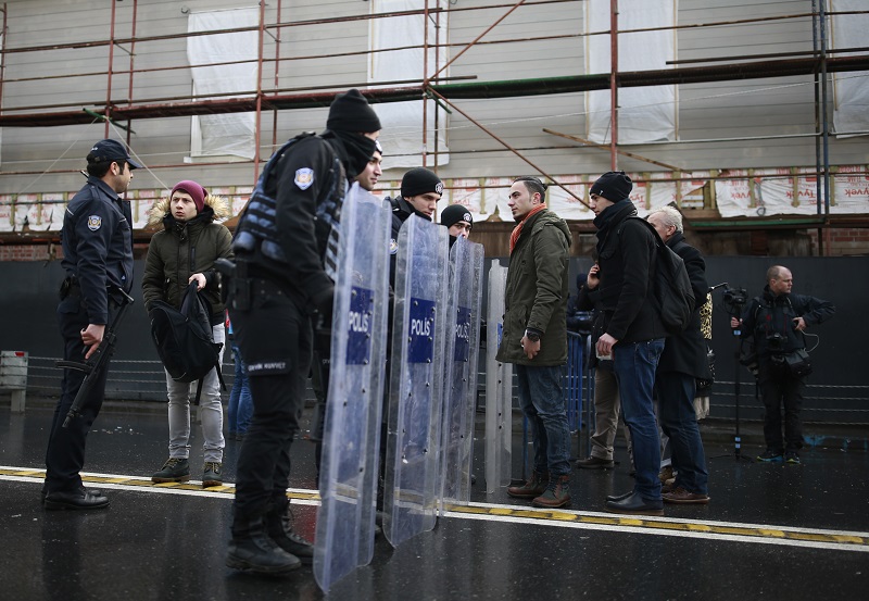 Turkish police officers block the road leading to the scene of an attack in Istanbul early Sunday. Photo: Emrah Gurel / Associated Press