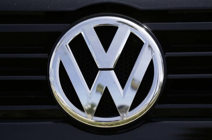A Volkswagen logo is seen on car offered for sale at New Century Volkswagen dealership in 2015 in Glendale, California. Photo: Damian Dovarganes / Associated Press
