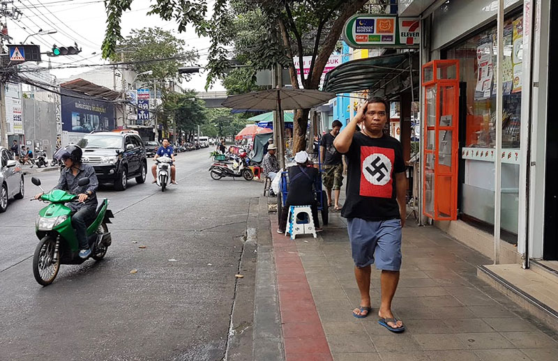 A man walks down Soi Rang Nam on Jan. 7 in Bangkok.