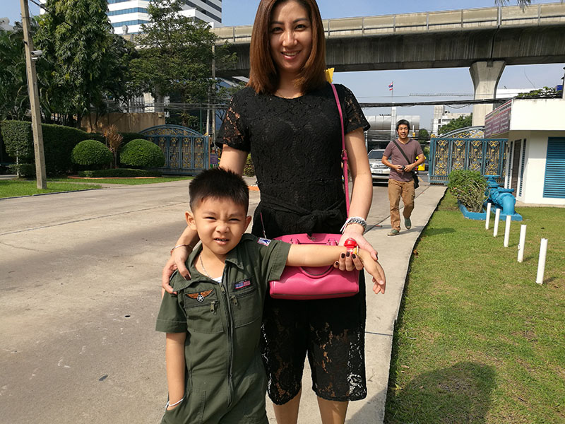 Pimpa Srathongthong brings her boy, 5, in mini-fatigues to the 2nd Cavalry Division King’s Guard for Children's Day on Saturday in Bangkok.