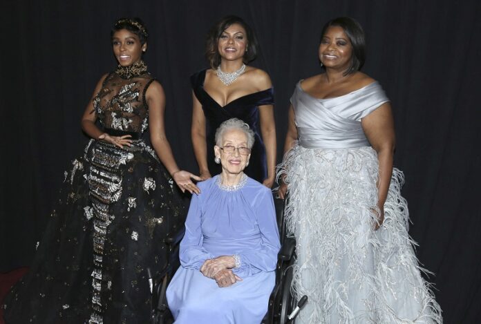 From left, Janelle Monae, Taraji P. Henson, and Octavia Spencer pose with Katherine Johnson, seated, backstage at the Oscars on Sunday at the Dolby Theatre in Los Angeles. Photo: Matt Sayles / Invision / Associated Press