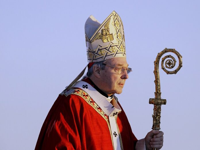 Cardinal George Pell walks onto the stage for the opening mass for World Youth Day in2008 in Sydney, Australia. Photo: Rick Rycroft / Associated Press