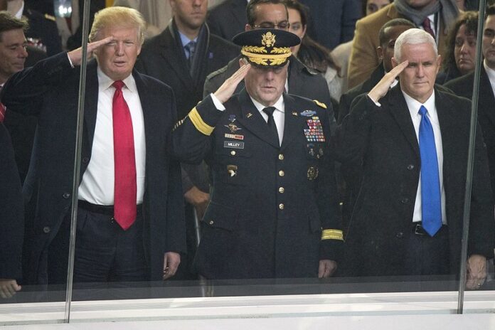 President Donald Trump and Vice President Michael Pence observe the 58th Presidential Inauguration Parade in January at the White House in Washington. Photo: Dominique A. Pineiro / Wikimedia Commons