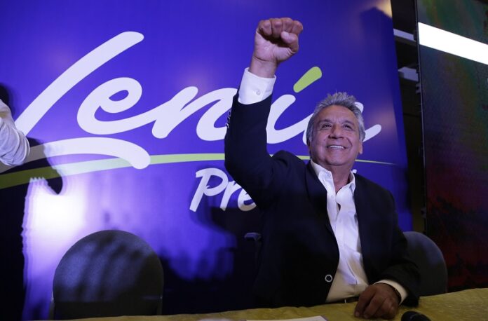 Lenin Moreno, presidential candidate for the ruling party Alliance PAIS, celebrates the closing of the polls for the general election Sunday in Quito, Ecuador. Photo: Dolores Ochoa / Associated Press