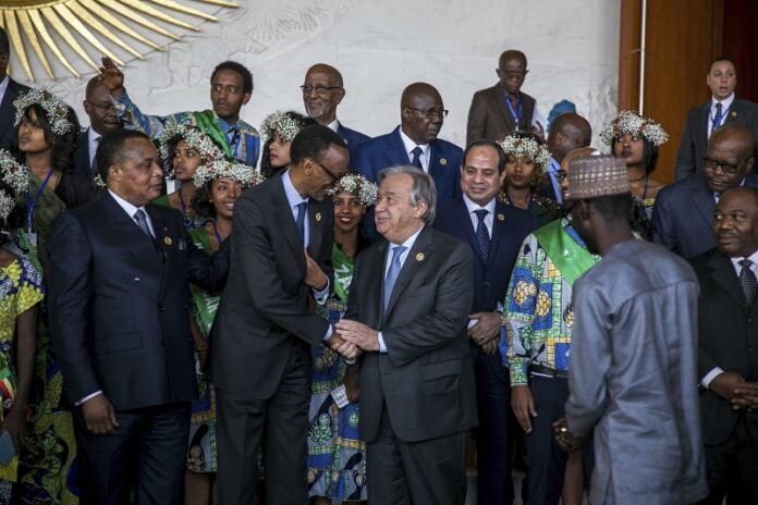 United Nations Secretary-General Antonio Guterres, centre right, shakes the hand of Rwandan President Paul Kagame on Monday during the 28th Ordinary Session of the Assembly of the African Union, in Addis Ababa, Ethiopia. Photo: Mulugeta Ayene / Associated Press