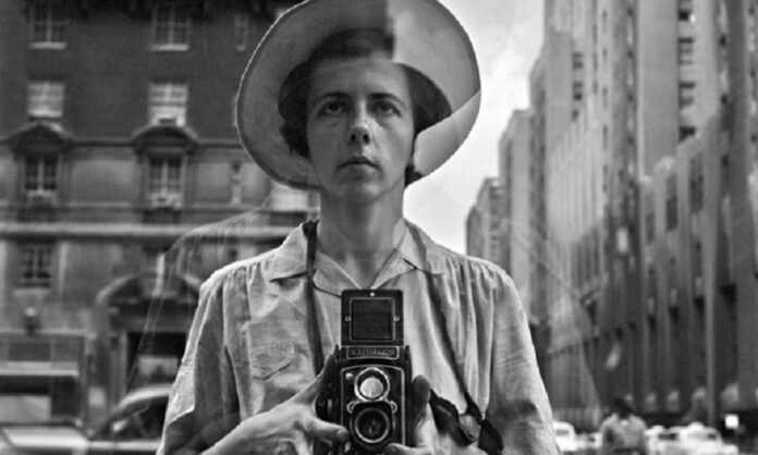 This 1950s photo provided by the Estate of Vivian Maier and John Maloof Collection shows Maier in a self-portrait as she looks into a storefront wearing a hat in New York. New research about Maier shows the enigmatic Chicago nanny was obsessive about honing her skills as a photographer starting in 1950. Photo: Vivian Maier / Estate of Vivian Maier and John Maloof Collection via AP)