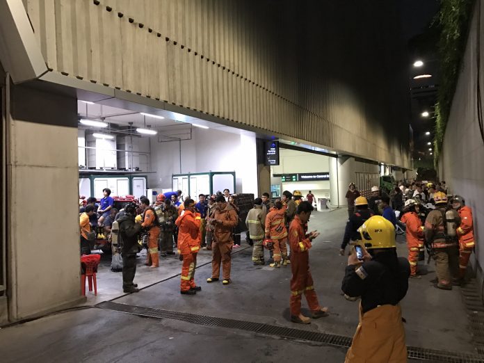 Firemen respond to the scene of a fire Thursday night at the Central Embassy shopping mall in Bangkok.