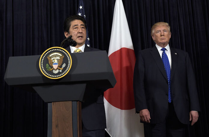 Japanese Prime Minister Shinzo Abe and President Donald Trump make statements in 2017 about North Korea at Mar-a-Lago in Palm Beach, Florida. Photo: Susan Walsh / Associated Press