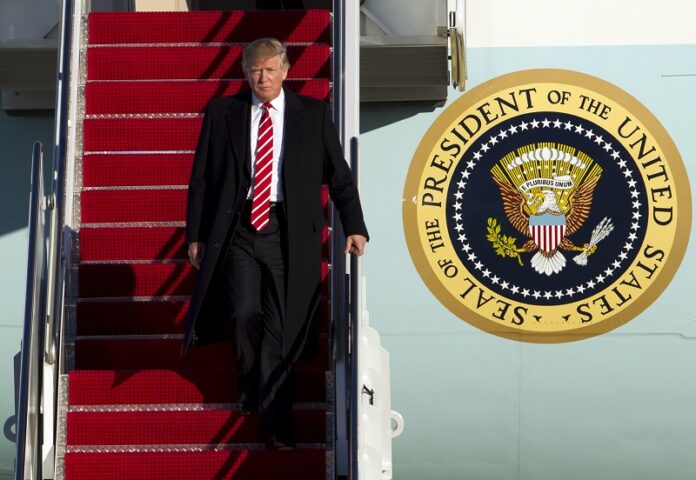President Donald Trump walks down the steps of Air Force One on Monday upon his arrival at Andrews Air Force Base, Maryland. Photo: Jose Luis Magana / Associated Press