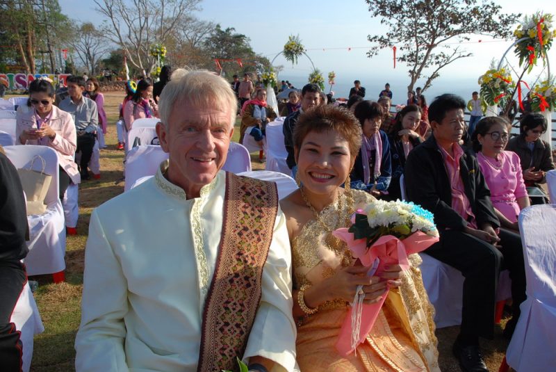One of about 30 couples to get married at Mo E Daeng Cliff in Si Saket. 