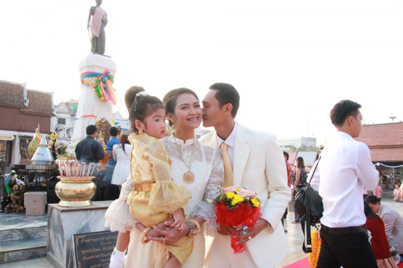 A mass wedding event is held in front of Thao Suranari Statue in Korat, joined by 21 couples.