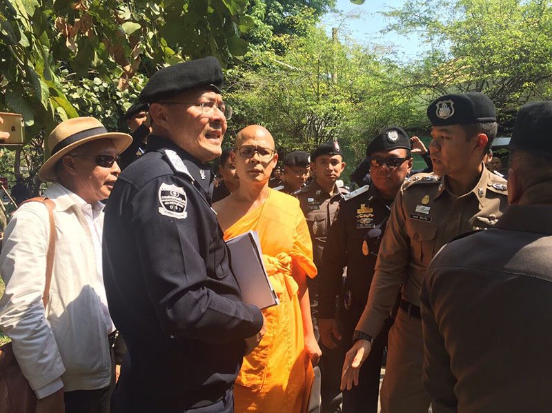 Police inside the temple.