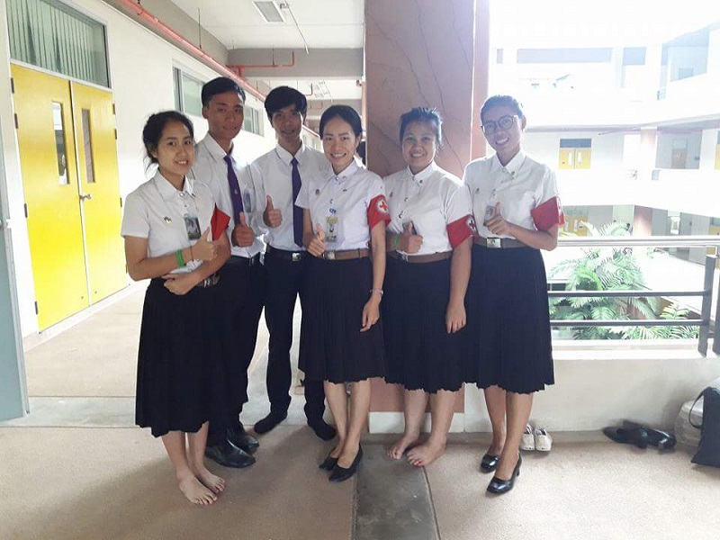 Sangduen Longta poses with her friends from medical school in Chiang Mai. Photo: Sangduen Longta / Facebook
