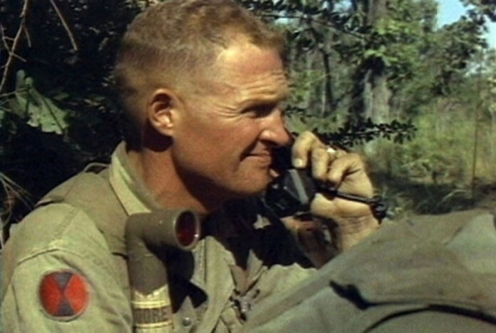 Lt. Col. Hal Moore, commander of the 1st Battalion, 7th Cavalry, on the radio during the fight for Landing Zone X-Ray in the Ia Drang Valley of Vietnam. Caption/Photo: U.S. Army