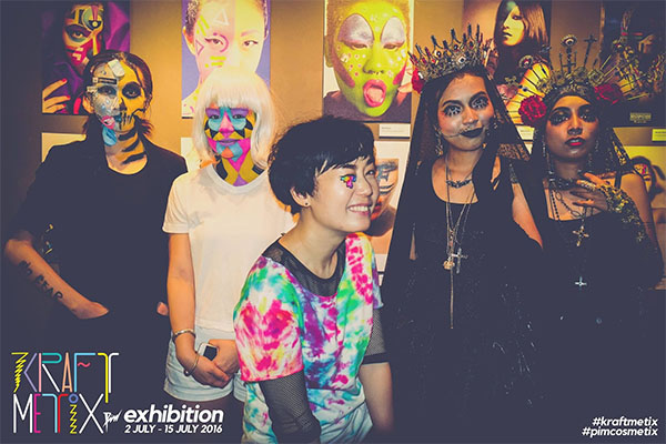 Ratchanee, at center, at a public art exhibition in July to promote her brand and body painting. Photo: PiM Cosmetix / Facebook 