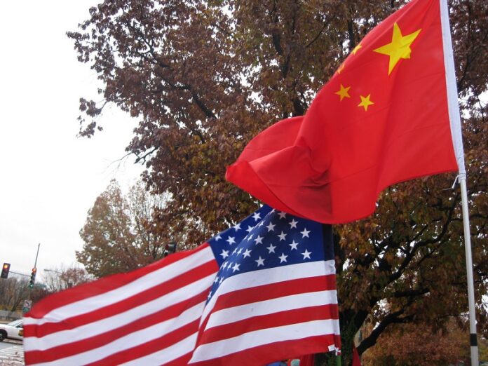 An American and a Chinese flag pictured here in 2008 at an undisclosed location. Photo: futureatlas.com / Flickr