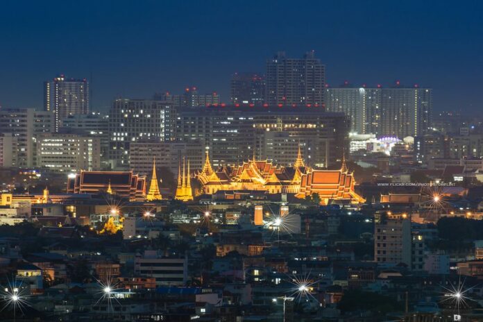 A June 25, 2013, file photo of the Grand Palace and Bangkok skyline. Image: Nik Cyclist / flickr