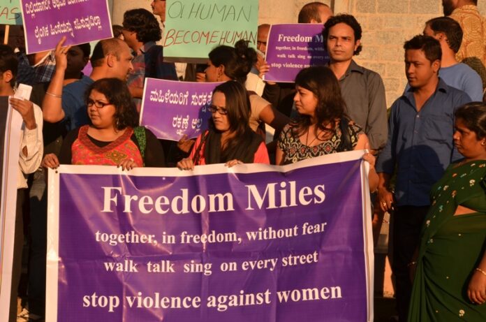 Members of Praja Rajakiya Vedike (PRV), Students Islamic Organisation (SIO), Karnataka Sexual Minorities Forum (KSMF), Eastern Fare Music Foundation (EFMF) and different other organisations of Bangalore protest outside Bangalore Town Hall in 2012 demanding justice for a 23-year-old student who died earlier in the year. Photo: Jim Ankan / Wikimedia Commons