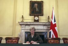 EU Court Adviser Says Britain Can Stop Brexit Britain's Prime Minister Theresa May sits below a painting of the country's first Prime Minister Robert Walpole in 2017 in 10 Downing Street, London. Photo: Christopher Furlong / Associated Press