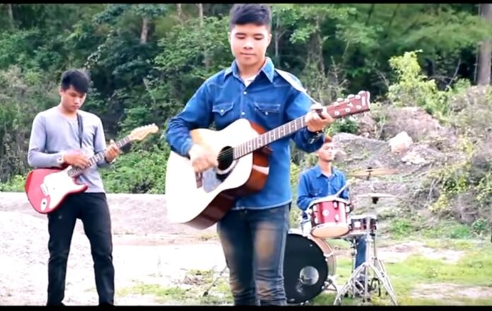 Chaiyaphum Pasae, front, seen in a music video he made with his friends. Image: Now Channel / YouTube