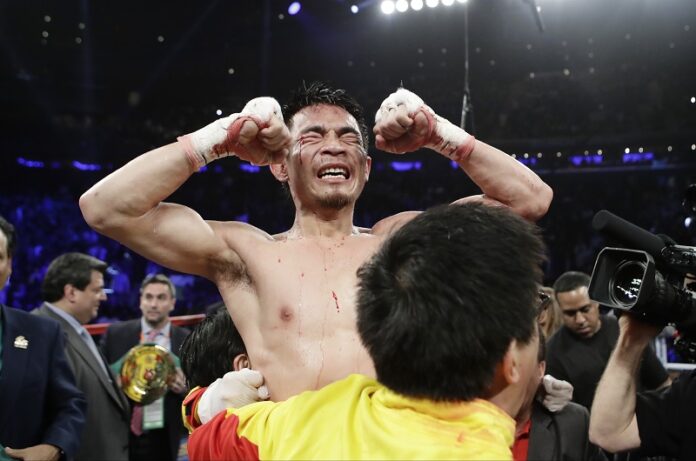 Srisaket Sor Rungvisai, of Thailand, celebrates after a super flyweight championship boxing match against Roman Gonzalez, of Nicaragua, last year in New York. Photo: Frank Franklin II / Associated Press