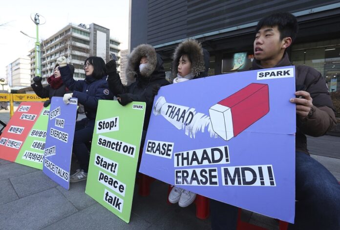 South Korean protesters stage a rally to oppose a plan to deploy an advanced U.S. missile defense system called Terminal High-Altitude Area Defense, or THAAD, and upcoming joint military exercises, dubbed Key Resolve and Foal Eagle, between the U.S. and South Korea, last month near the U.S. Embassy in Seoul, South Korea. Photo: Ahn Young-joon / Associated Press