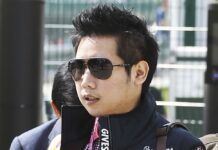 Red Bull Heir Enjoys Jet-Set Life 4 Years After Hit-and-Run Vorayuth 'Boss' Yoovidhya, who has evaded justice for years in the death of a Thonglor police officer, spotted in 2013 at the British Formula 1 Grand Prix in Silverstone, England, in a photo provided by XPB Images. Photo: XPB Images / AP