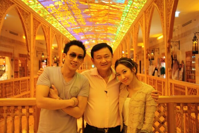Former Prime Minister Thaksin Shinawatra in a 2011 photo with his children, Panthongtae Shinawatra, at left, and Pinthongta Shinawatra. Photo: Oak Panthongtae Shinawatra / Facebook
