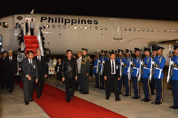 President Duterte seen here on Monday night as he arrives to Wing 6 of Don Mueang Royal Thai Air Force Base.