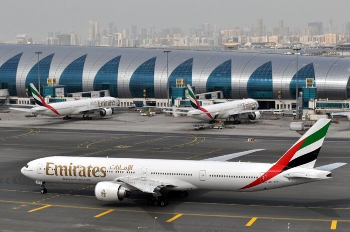 An Emirates plane taxis to a gate at Dubai International Airport in March at Dubai International Airport in Dubai, United Arab Emirates. Photo: Adam Schreck / Associated Press