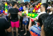 Final Fun for Festival Faithful: Silom Stages Songkran Send Off (Photos) Revellers celebrate the last day of Songkran last year in Silom.