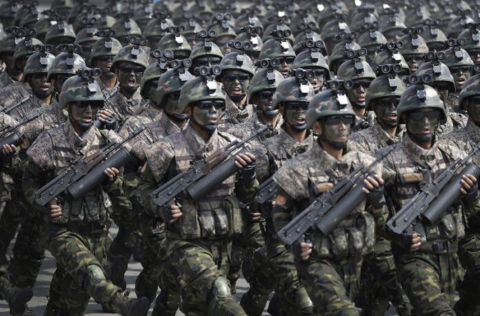 Commandoes on Saturday march across the Kim Il Sung Square during a military parade. Photo: Wong Maye-E / Associated Press