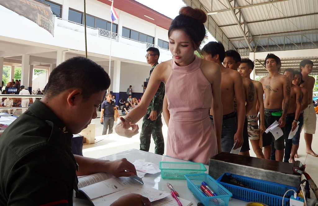 A transgender woman gives a fingerprint Wednesday at a recruitment center in Nakhom Phanom province. <strong>Read: <a href="https://www.khaosodenglish.com/politics/2017/03/30/draft-day-thai-media-asked-not-ridicule-trans-women/">This Draft Day, Thai Media Asked Not to Ridicule Trans Women</a></strong>