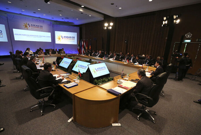 ASEAN Foreign Ministers talk during the ASEAN Foreign Ministers Meeting in metropolitan Manila on Friday. Photo: Aaron Favila / Associated Press