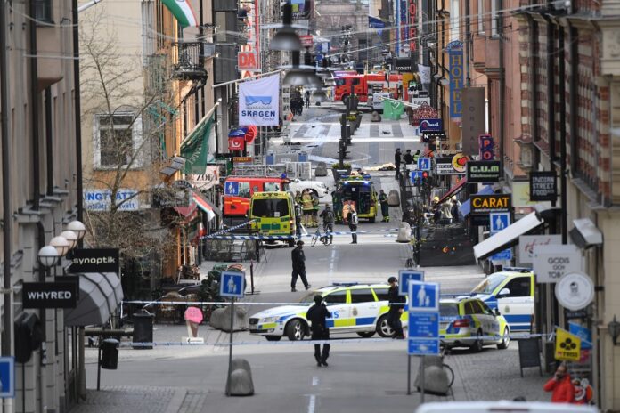 A view of the scene after a truck crashed into a department store injuring several people Friday in central Stockholm, Sweden. Photo: Fredrik Sandberg / Associated Press
