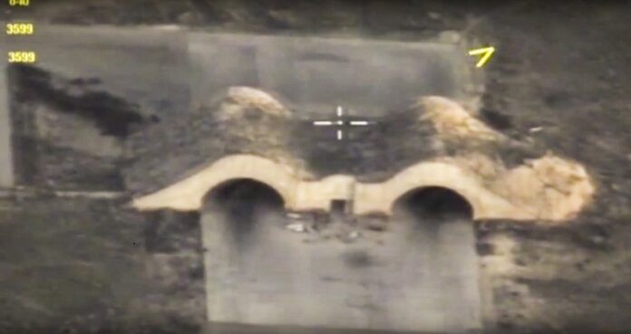 Photo made from the footage taken from Russian Defense Ministry official web site on Friday shows shelters for aircraft at a Syrian airbase after it was hit by US strike in Syria. Photo: Russian Defense Ministry Press Service Photo / Associated Press