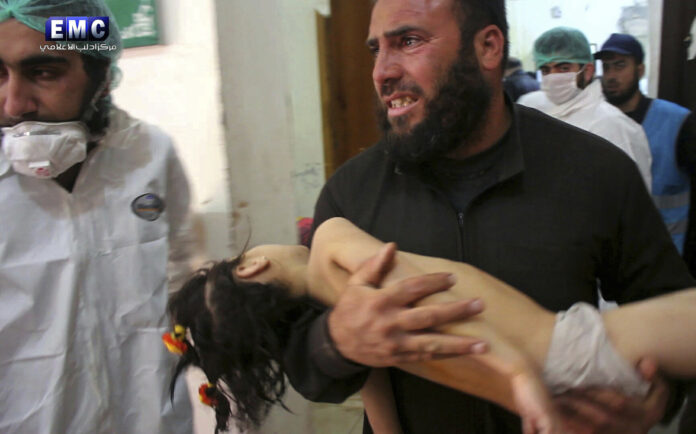A photo provided Tuesday by Syrian anti-government activist group Edlib Media Center, authenticated based on its contents and other AP reporting, shows children following a suspected chemical attack, at a makeshift hospital, in the town of Khan Sheikhoun in northern Syria. Photo: Edlib Media Center / Associated Press