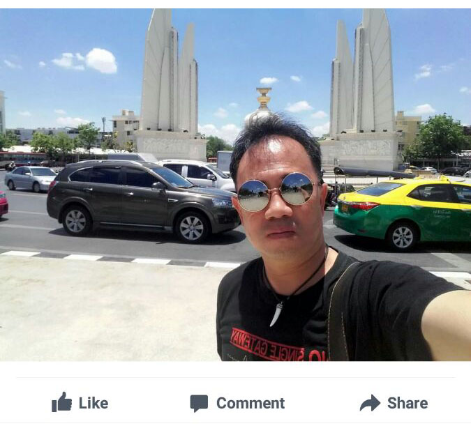 Redshirt activist Anurak Jeantawanich, aka Ford Red Path, posted a photo of himself at the Democracy Monument on Monday. Photo: Anurak Jeantawanich / Facebook